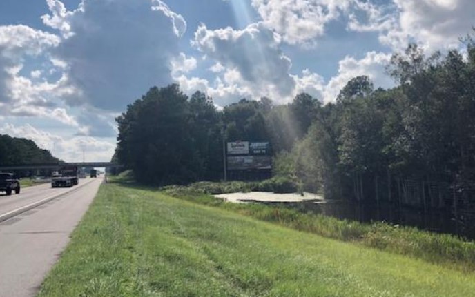 I-10 - East of St. Maryfts Rd past Exit 104 in Caryville - North side of I-10 Top Panel. E/F RR Media