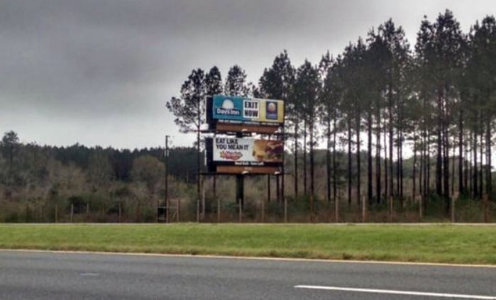 Location photo for I-10 - west of Chipley Exit 120 on south side of Interstate S/S. Bottom Panel. W/F RR