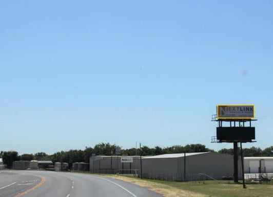 HWY-114 .06 E OF FM 2123 MP12, S/S TOP Media