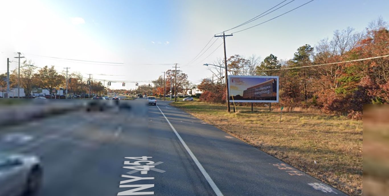 Vets Memorial Hwy, northeast corner of Locust Ave., facing east Media