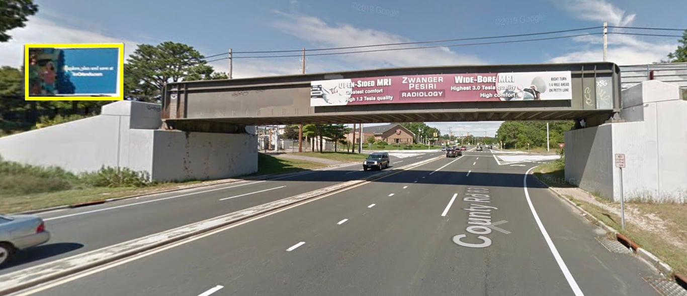 on North Ocean Ave, 1/4 mile south of LIE, southwest side, facing south Media