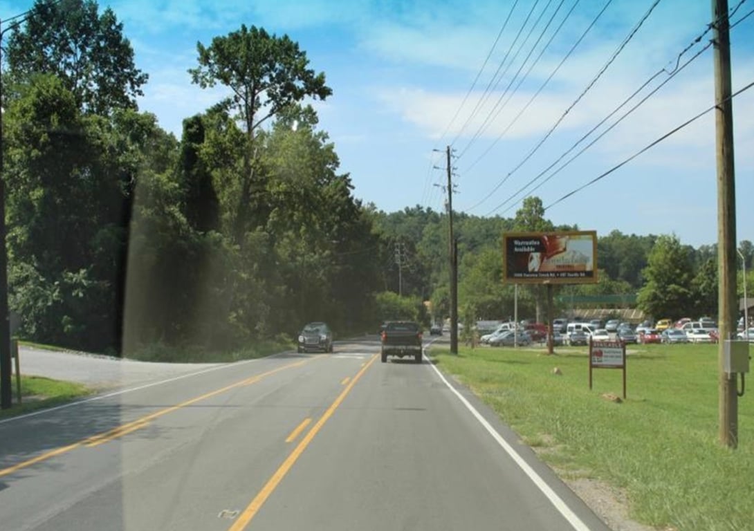 SWEETEN CREEK RD 550' N/O MILLS GAP RD WS Media