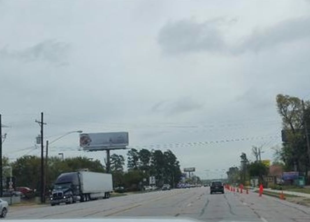 SH 105/ 1 mi W/O I-45/H.S. Media
