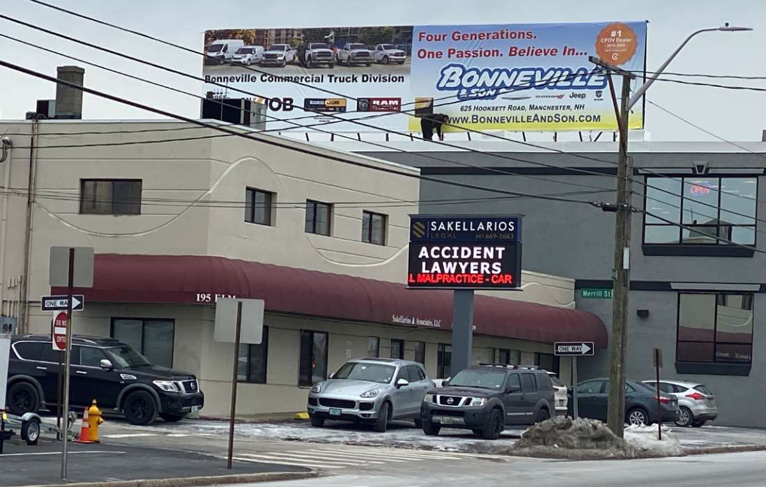 Sits on top of a building and gets great exposure Media