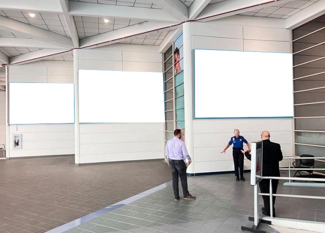 NO REAL ESTATE as per competitive separation agreement (to TFD-14). Prominent tension fabric display located in the lobby and will target domestic arrivals as they make their way to baggage claim and ground transportation.