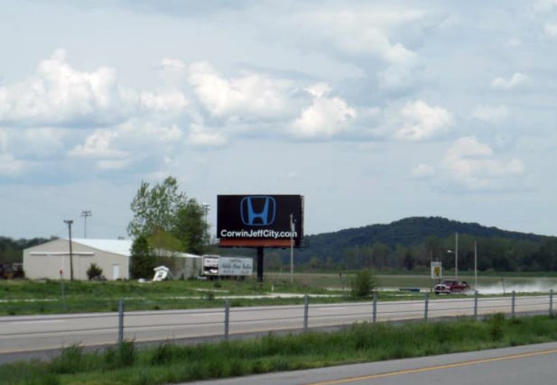 W/S HWY 63 2.2 MI N/O HWY 54, N/B Media