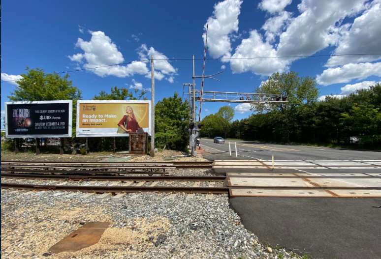 Bethpage: on Oyster Bay Rd at RR crossing next to Grumman, facing south Media