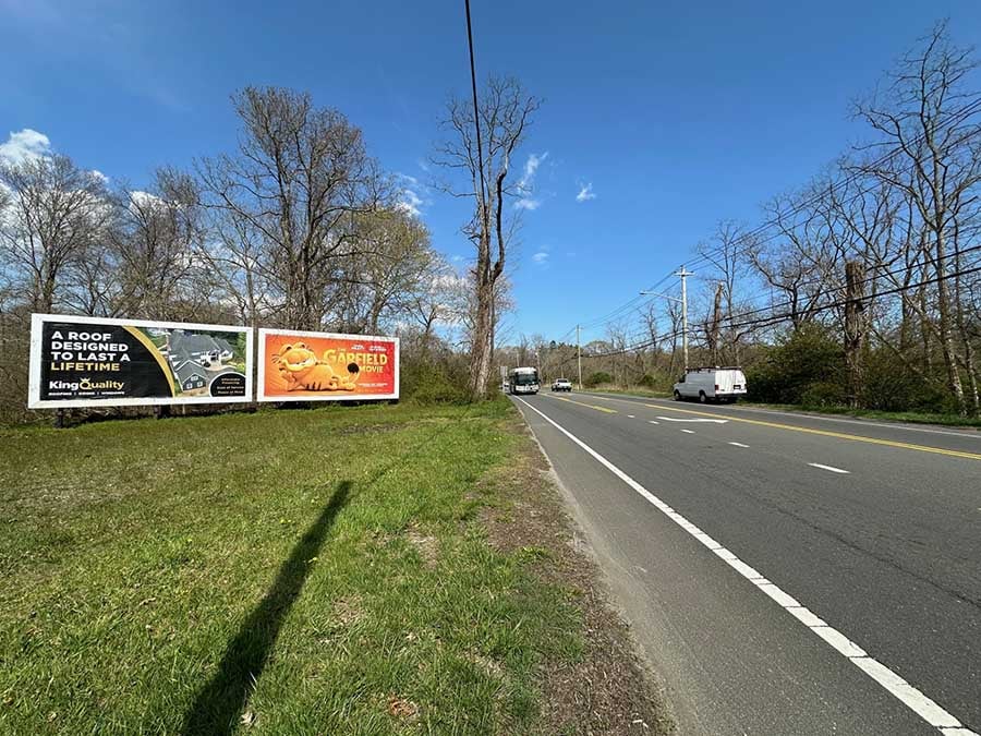 Brookhaven: north side of Route 27A, 135' east of Yaphank Ave., facing west Media
