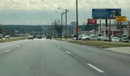 Location photo for 6432 E Independence Blvd 600 ft W/O Sharon Forrest Dr SS