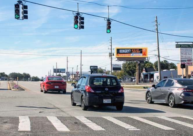 N/S E. Colonial DR. .05 mi W/O Semoran Blvd F/E Media