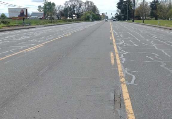 HWY 99E EL 500' S/O ELLINGSON RD. SW. Media