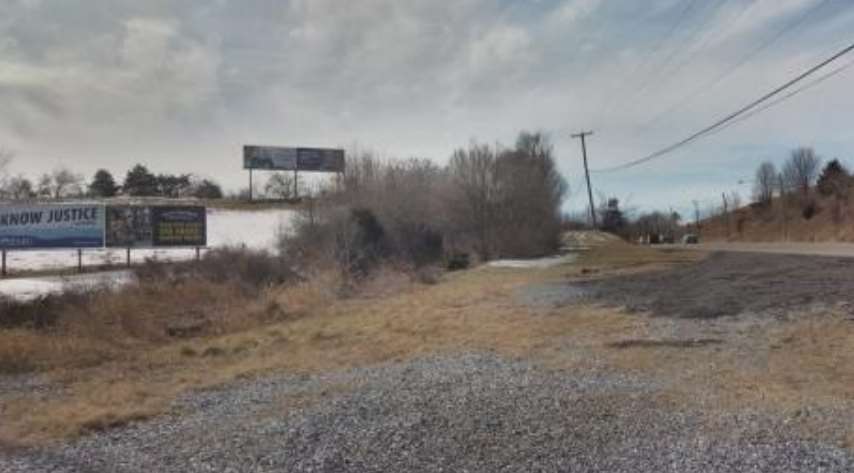 E/S HWY 11 @ BYPASS, BOTTOM OF HILL #1 Media