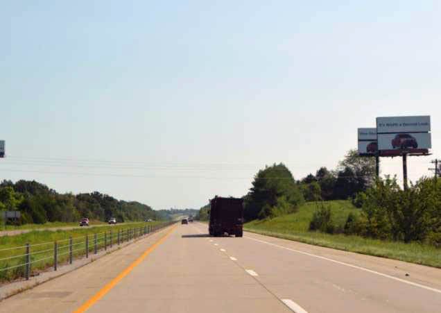 S/S HWY 54 3.9 MI W/O RT. H, E/B TOP Media