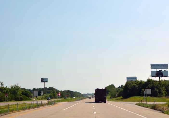 S/S HWY 54 4 MI W/O RT. H, E/B BTM Media