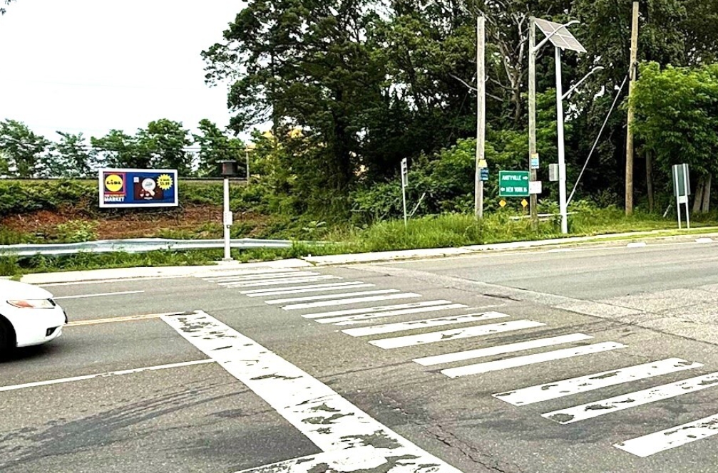 Massapequa Park: on Carman Mill Rd south of Sunrise Hwy, facing south