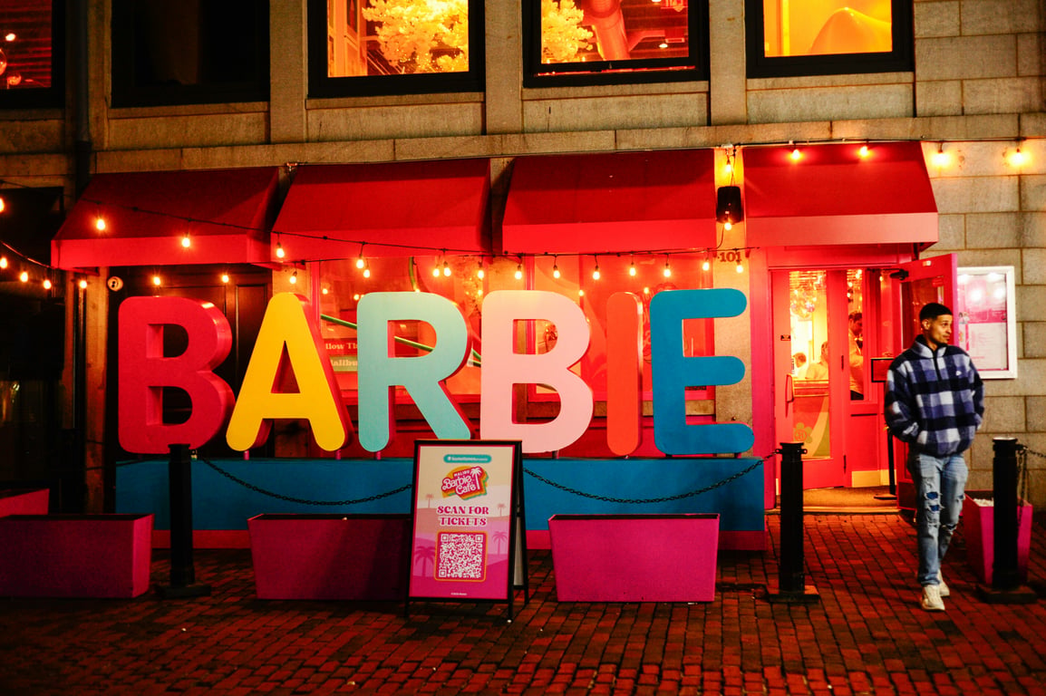 Brand activation in out-of-home (OOH) advertising depicted by Barbie letters and sign outside storefront