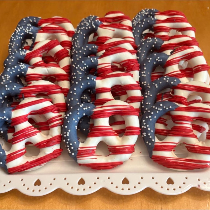 Custom chocolate-dipped pretzels decorated for holidays, birthdays, school events, and celebrations. Fishers Indiana