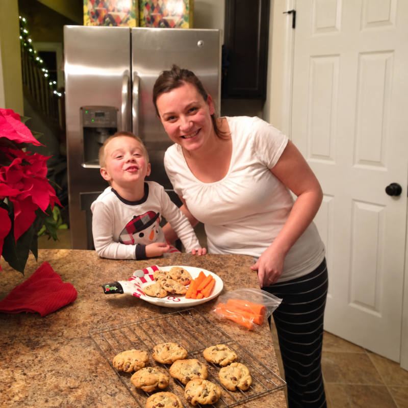 Jamie and Miller baking cookies together at home.