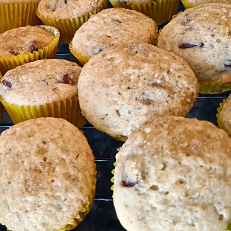 Photo of Bakery-Style Chocolate Chip Mini Muffins on a Wire Cooling Rack