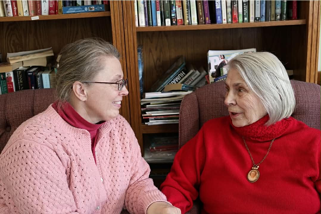 A mother and daughter having a conversation 