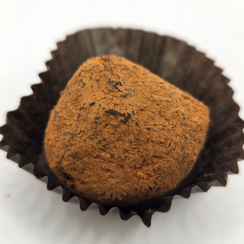 cocoa powder dusted truffle