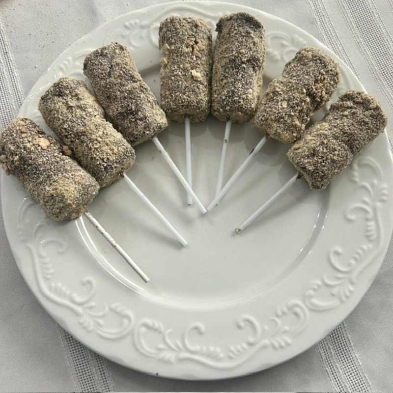 2 Toasted Marshmallows, dipped in chocolate and rolled in graham crackers.