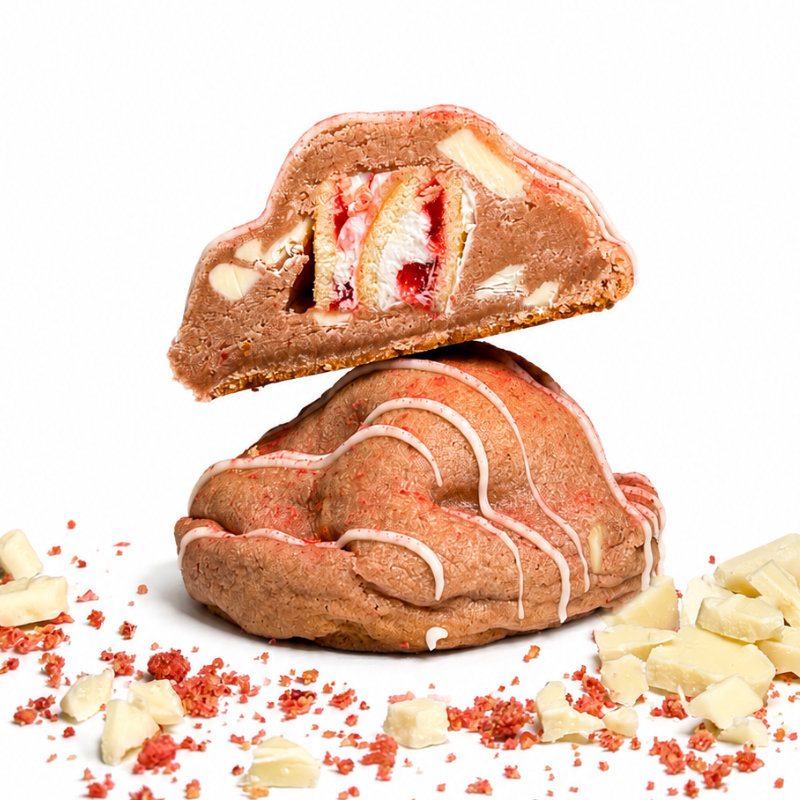 Strawberry cookie with white chocolate chips stuffed with a slice of Swiss roll cake.