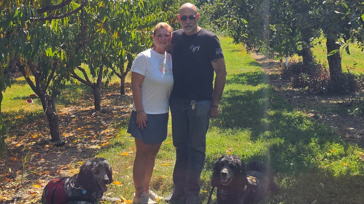 Our team photo, from left to right, Oso (Shana's service dog), Shana, Deano, Kole (Deano's service dog)