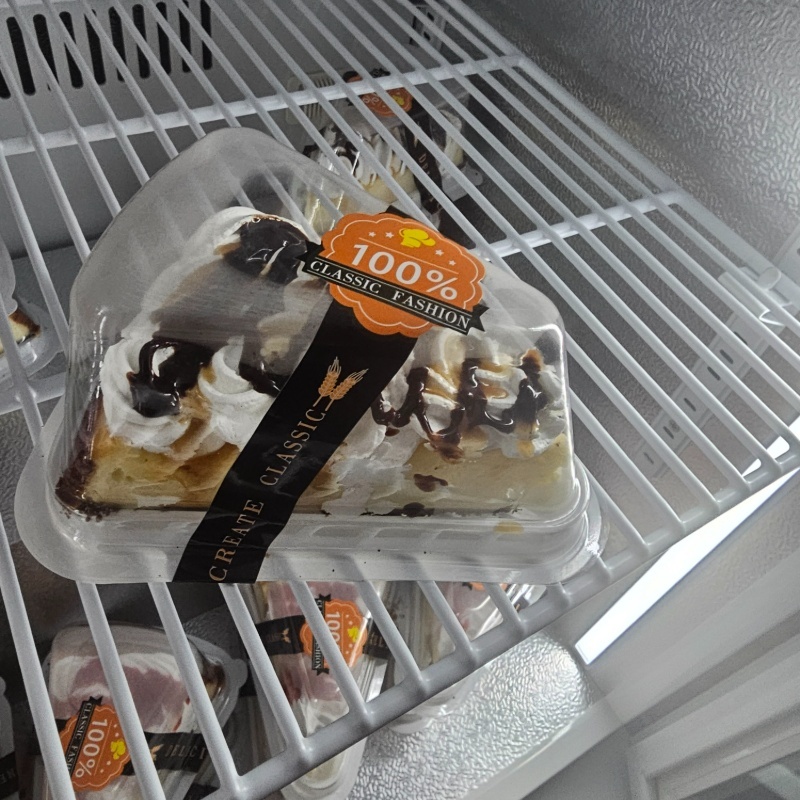 Photo of New York Cheesecake with Caramel & Fudge Drizzle