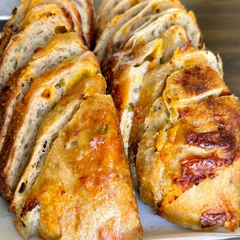 Classic Sourdough Loaf infused with sharp cheddar and jalapeños.  Perfect as toast with eggs or on a sandwich.