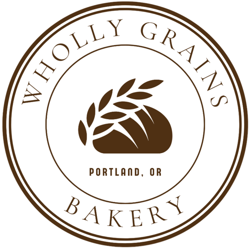 Wholly Grains Bakery logo