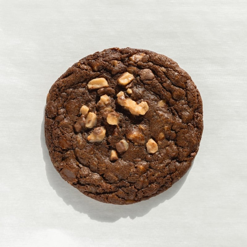 Chocolate toffee cookie topped with toffee bits