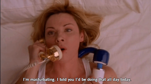 Samantha Jones from Sex and the City holding the Hitachi Magic Wand vibrator.