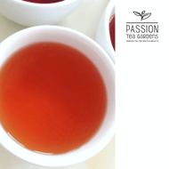 Passion Tree Gardens logo and tea