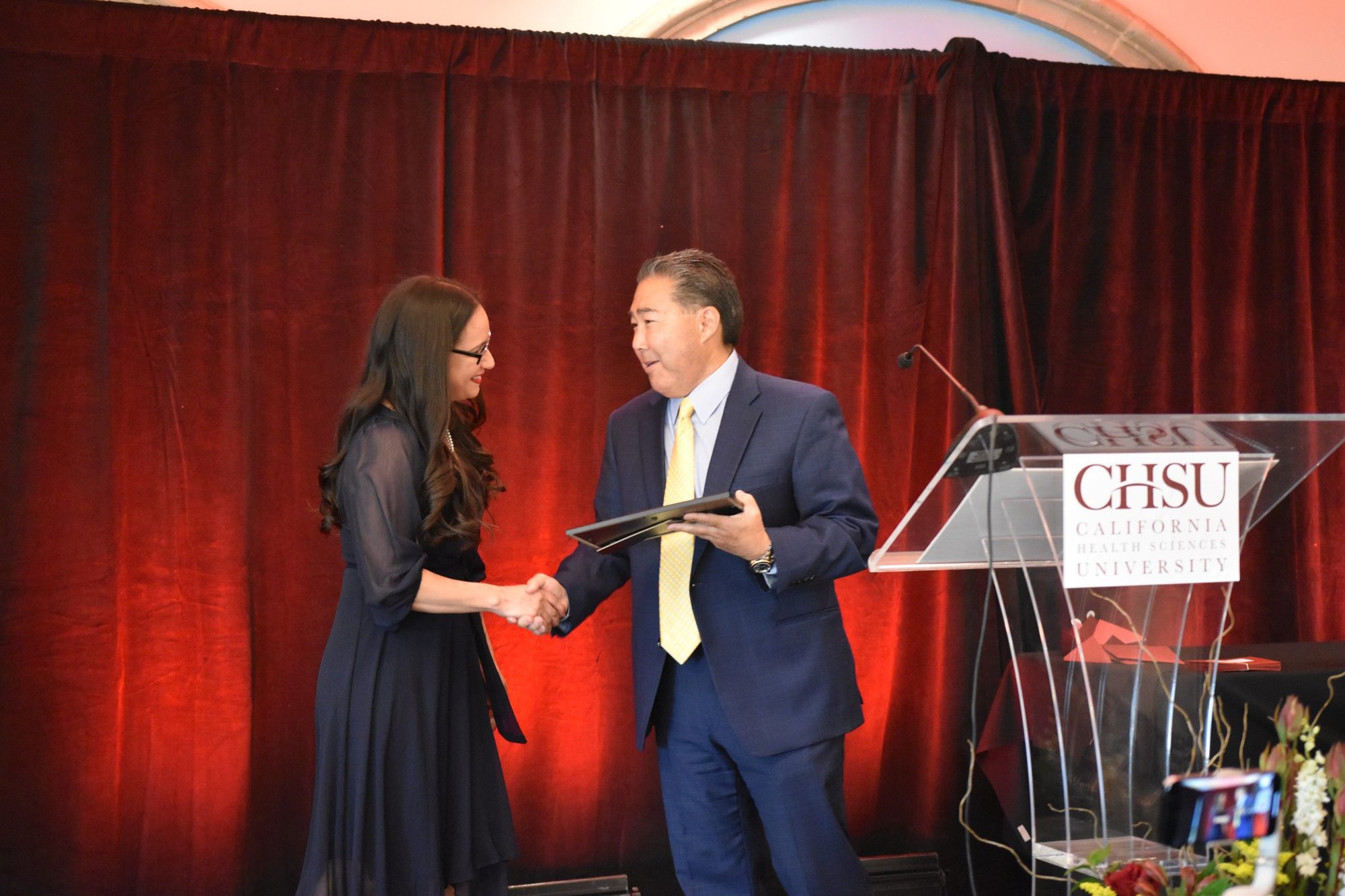 Graduate-Awards-Dinner-Stephanie-Aquino-accepts-Wolters-Kluwer-Award-of-Excellence-in-Clinical-Information