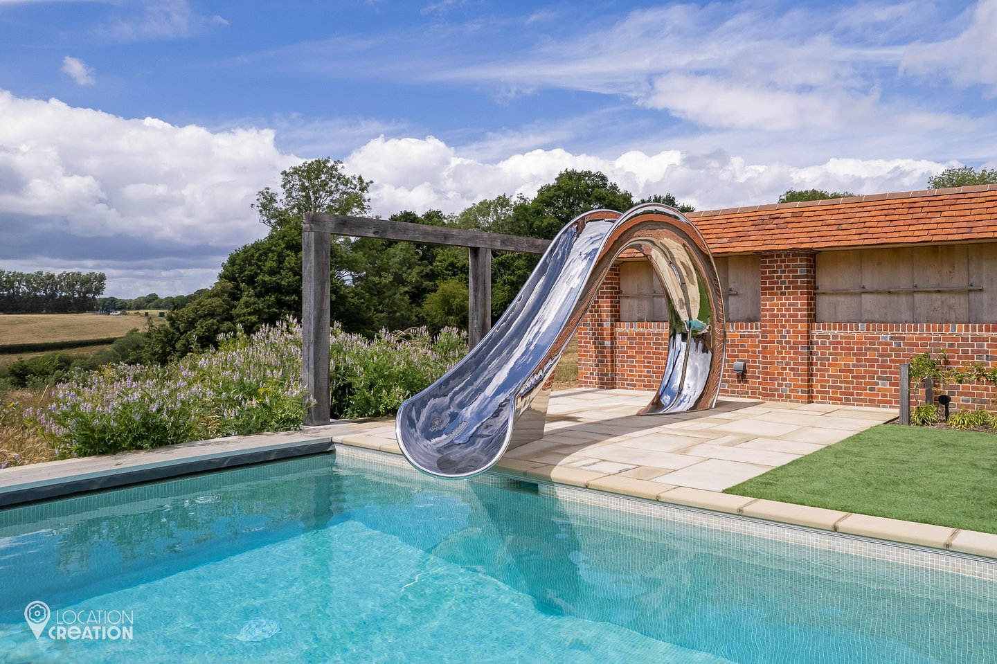 Location Creation Silver Slide Pool