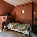 upstairs room turned into a butler's bedroom for a film featuring French movie star Jean Reno, August 2025
