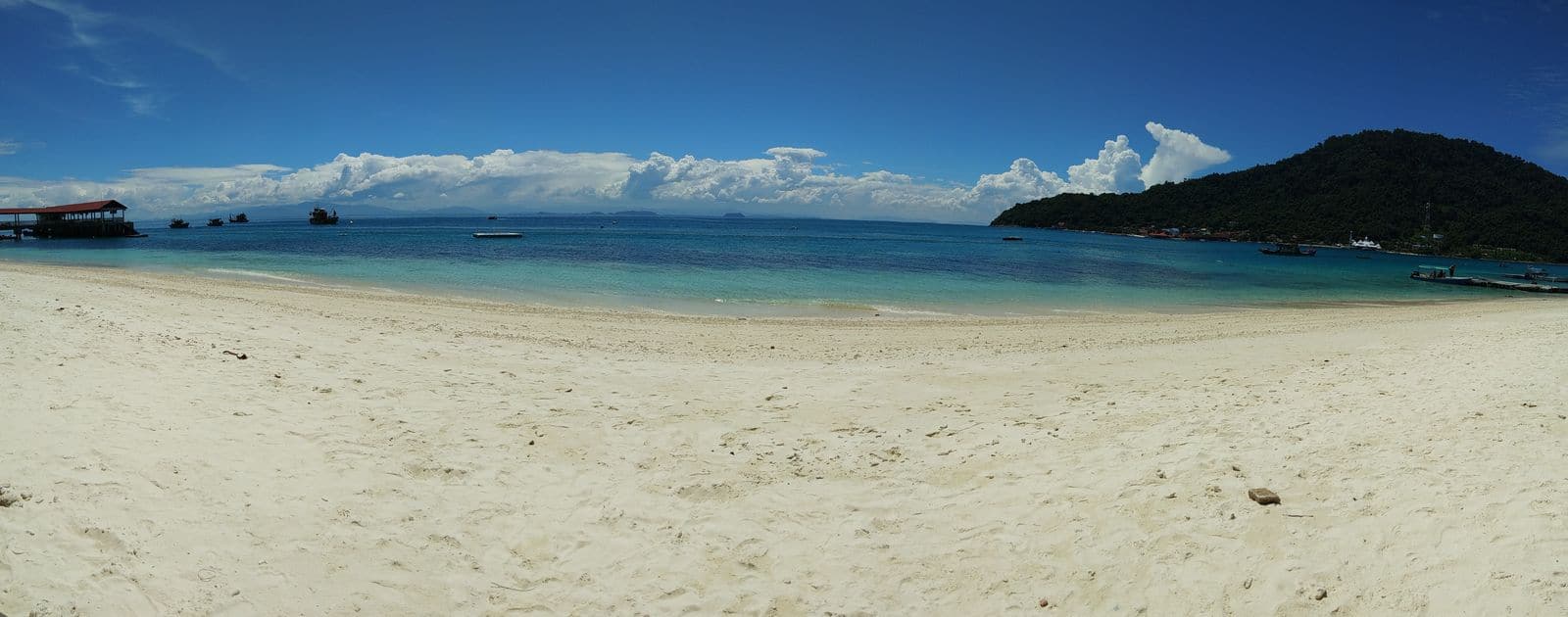 A panoramic view of the stunning beach at Tuna Bay in the Perhentian Islands