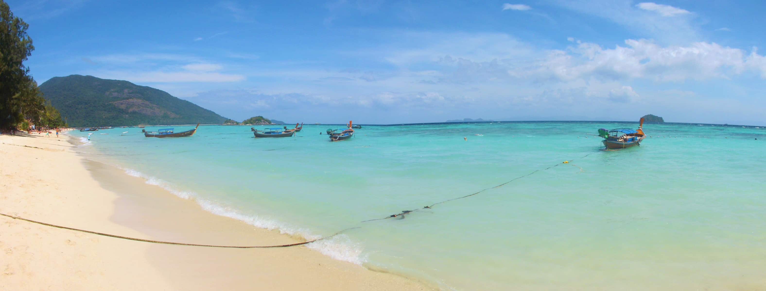 A panoramic picture of Sunrise Beach in Koh Lipe, Thailand // travelmermaid.com