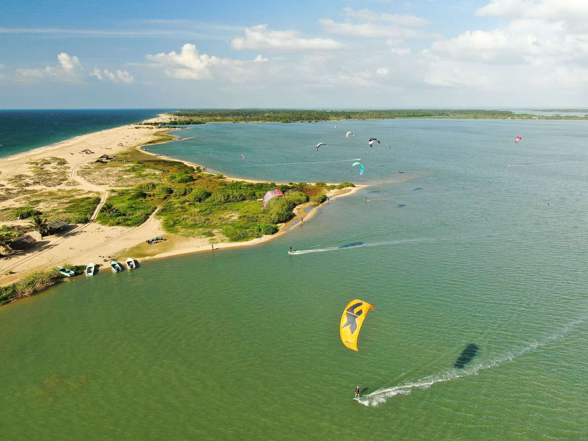 Drone shot of kitesurfers riding on Kalpitiya Lagoon in Sri Lanka
