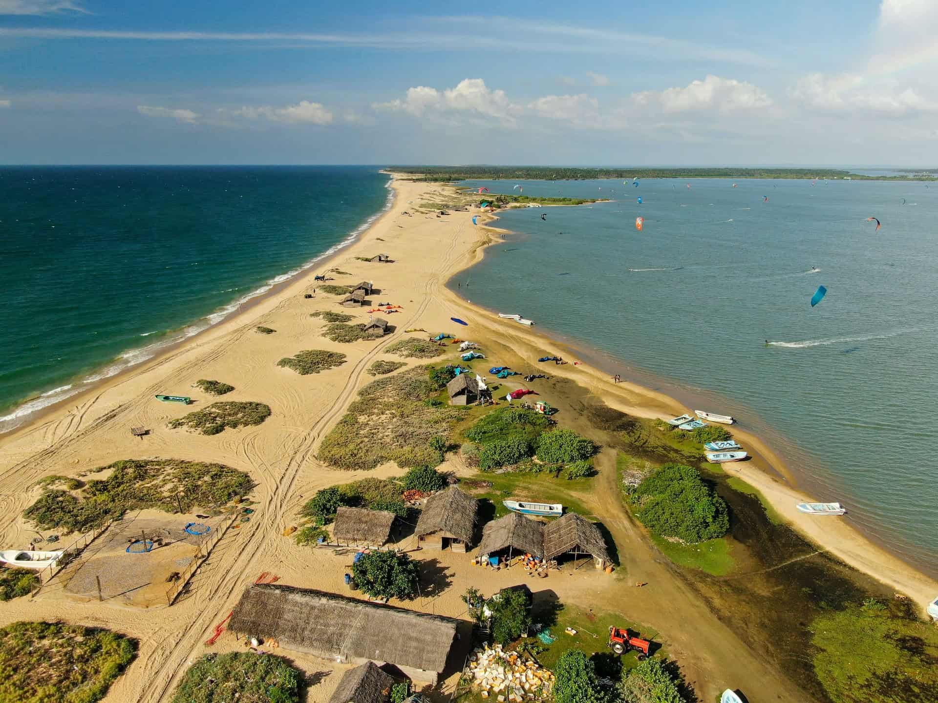 Drone shot of kitesurfers riding on Kalpitiya Lagoon in Sri Lanka