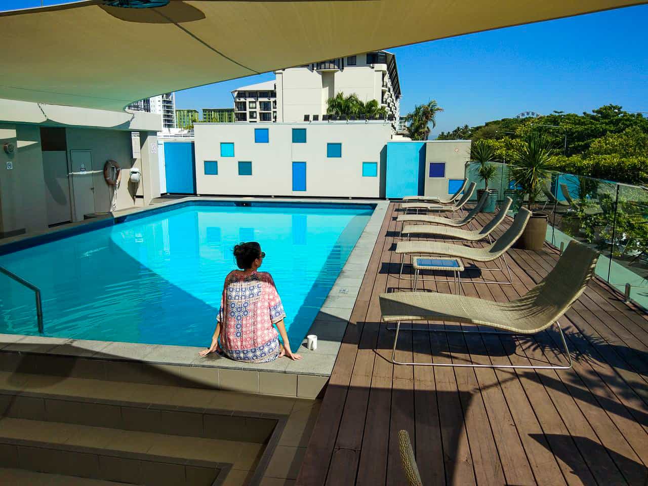 By the pool at Pacific Hotel Cairns, Australia // Travel Mermaid