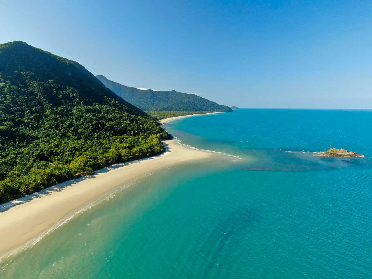 An aerial shot of Thornton Beach and the Daintree Rainforest in Cape Tribulation, Australia // Travel Mermaid