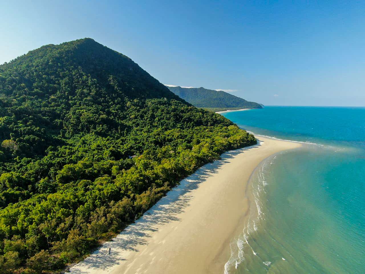 An aerial shot of Thornton Beach and the Daintree Rainforest in Cape Tribulation, Australia // Travel Mermaid