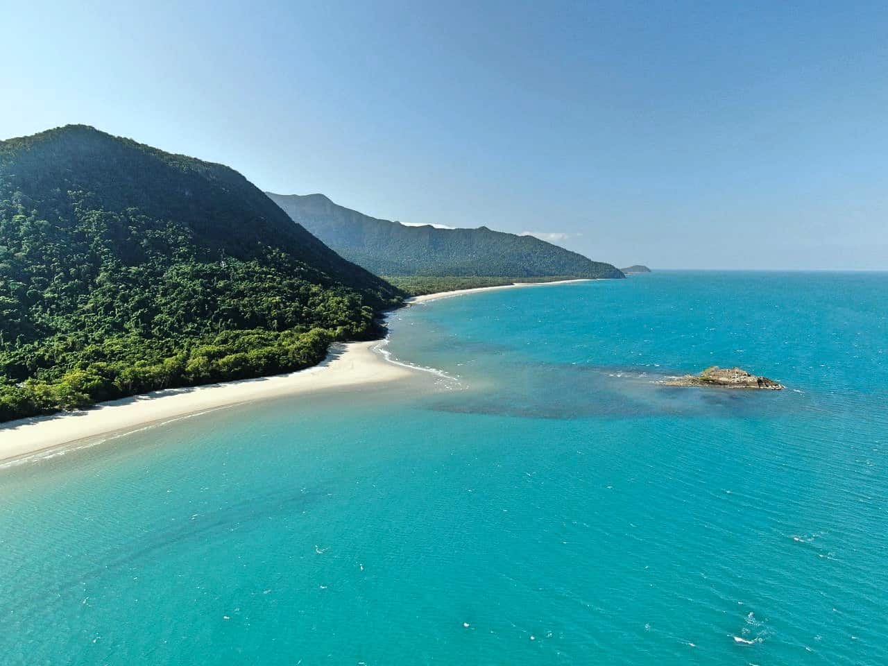 An aerial shot of Thornton Beach and the Daintree Rainforest in Cape Tribulation, Australia // Travel Mermaid