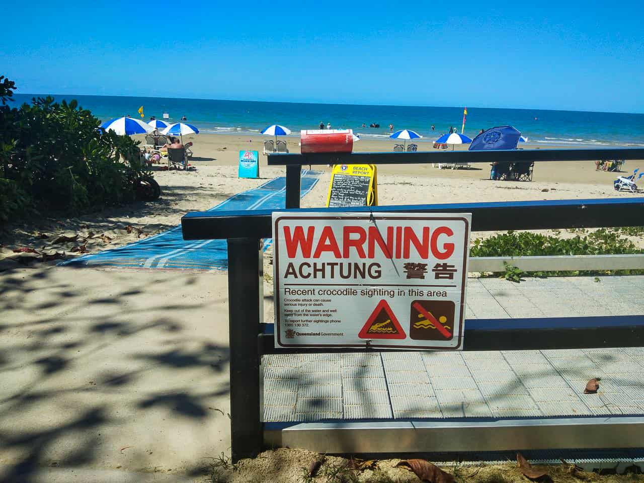 Crocodile warning sign on Four Mile Beach Port Douglas, Queensland - Australia // Travel Mermaid