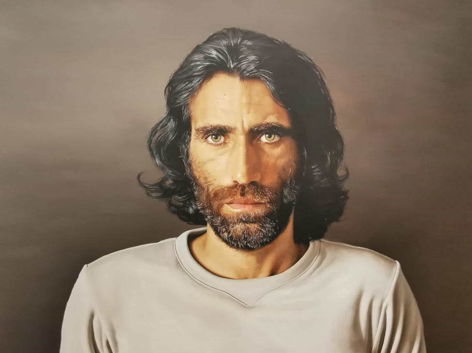 Archibald Prize 2020 Winner of the People's Choice Award, picture by Angus McDonald of Iranian Behrouz Boochani exhibited at the Cairns Gallery // Travel Mermaid