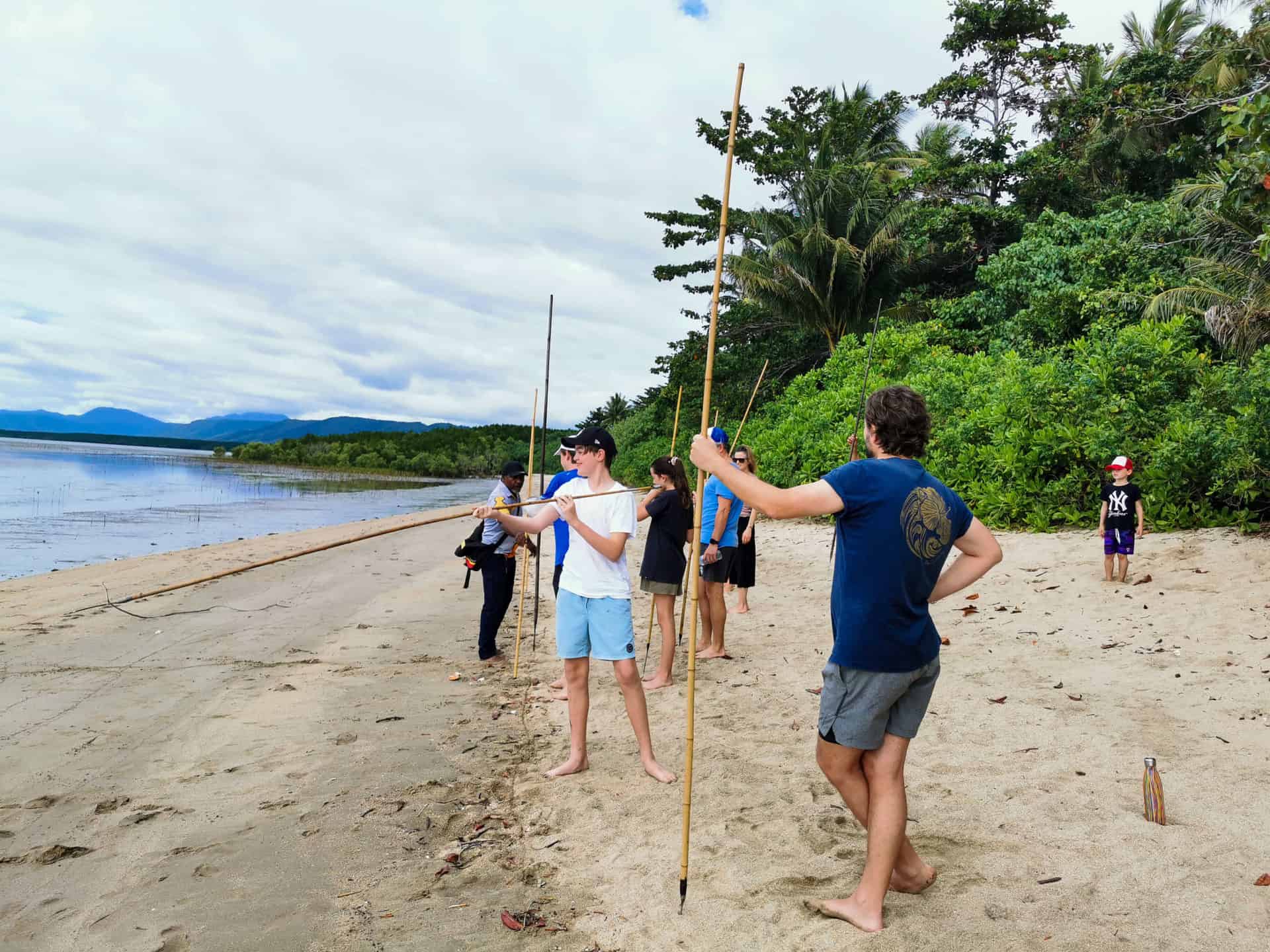 Local guide Aaron teaching us how to spearfish for mud crabs at Cooya Beach with Walkabout Cultural Adventures // Travel Mermaid