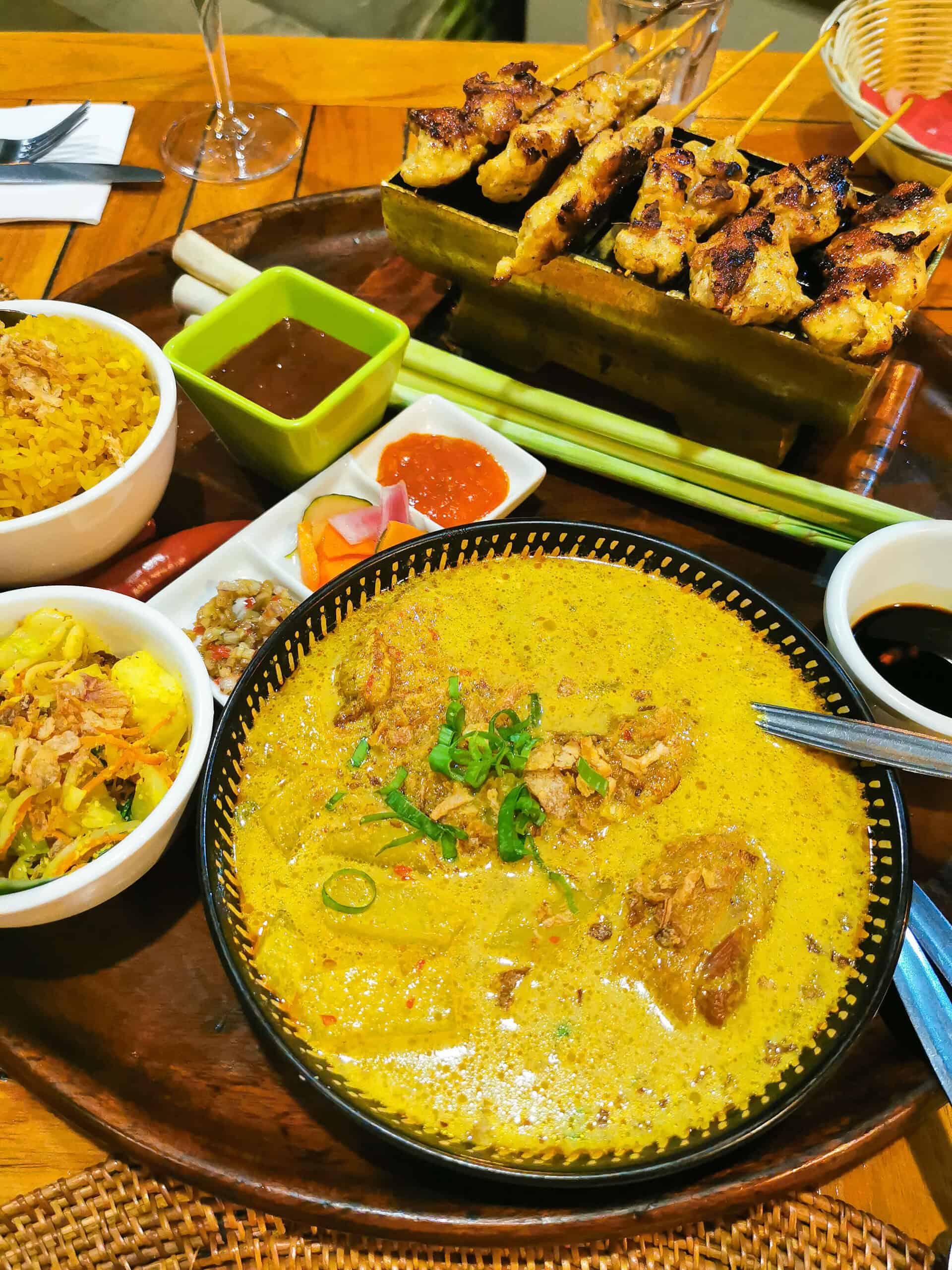 A Balinese banquet with curry, rice and satay at Bayleaf restaurant in Cairns, Far North Queensland