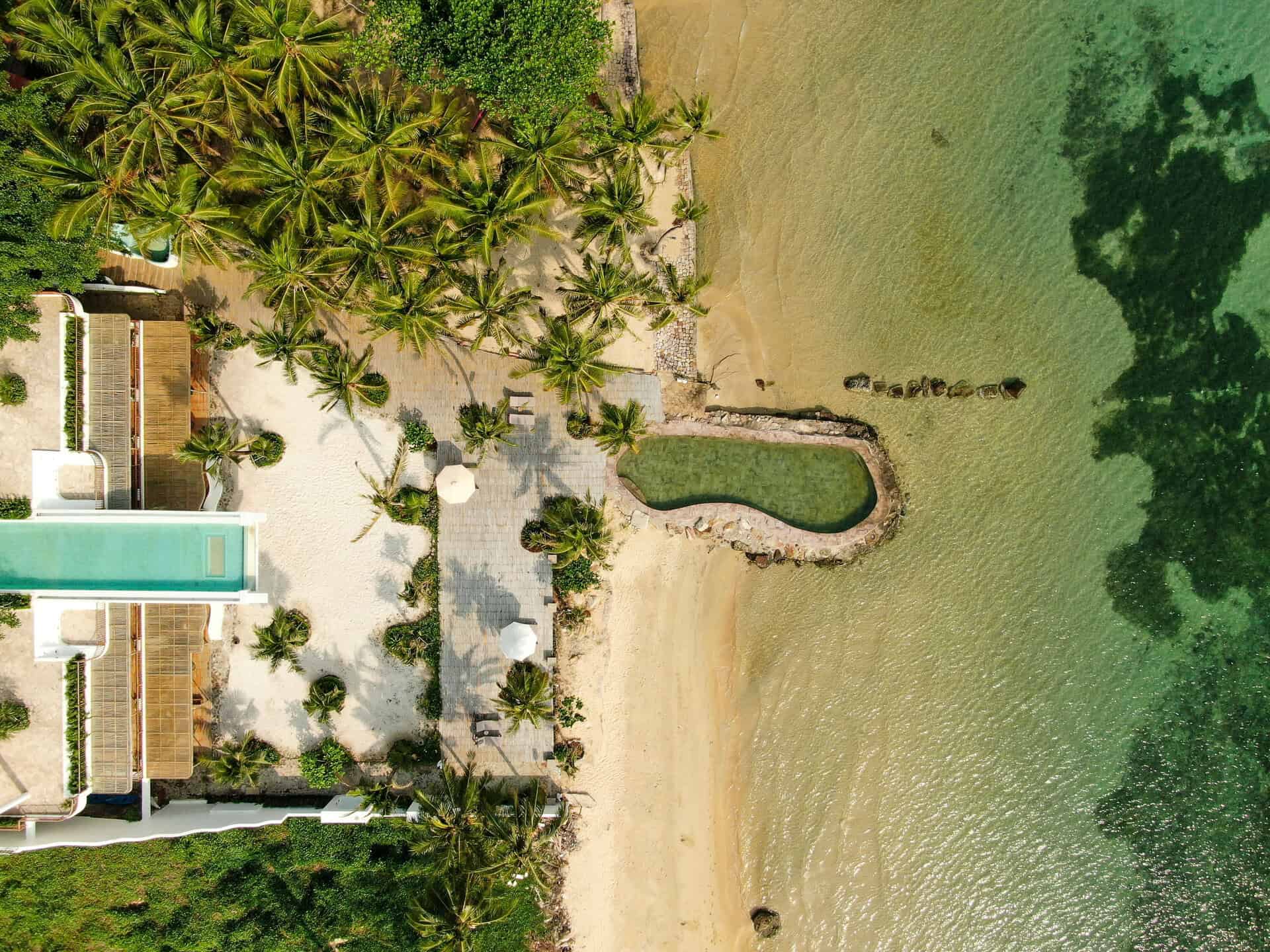 A drone shot of idyllic Casa D'Elysea beach villa in Phu Quoc, Vietnam